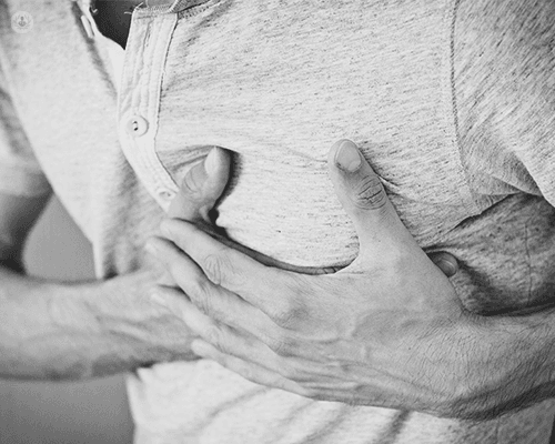 Man holding chest pain